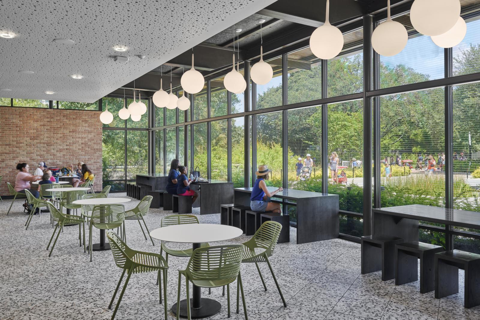Interior cafe dining A redesigned front entrance, Cypress Circle Cafe sited along the Zoo’s new multi-species Texas Wetlands habitat creates a new iconic identity and positions the zoo as leaders in conservation and education. Green Restaurant Certified.